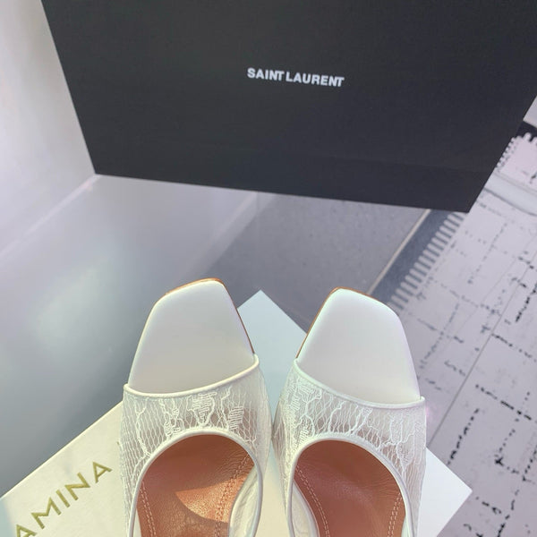 AMINA M HEELS