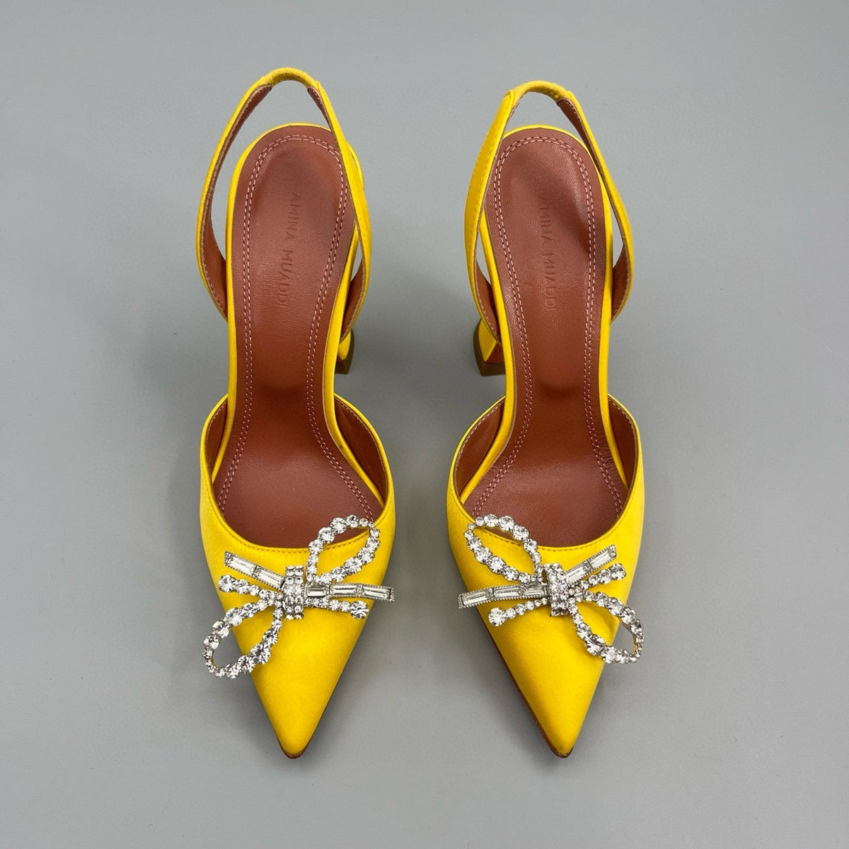 AMINA M HEELS