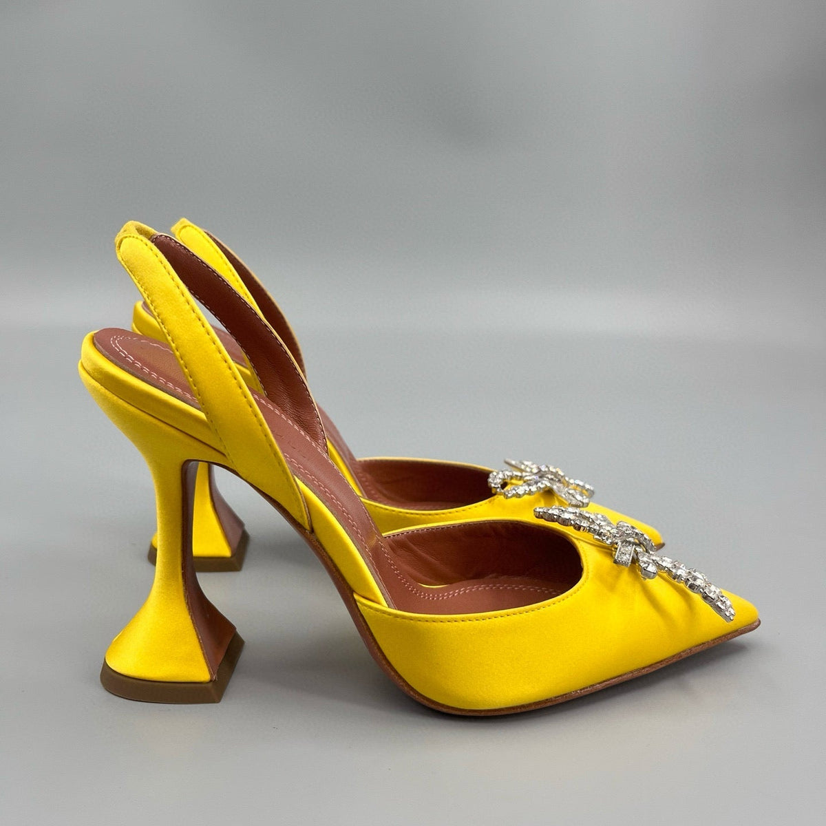 AMINA M HEELS