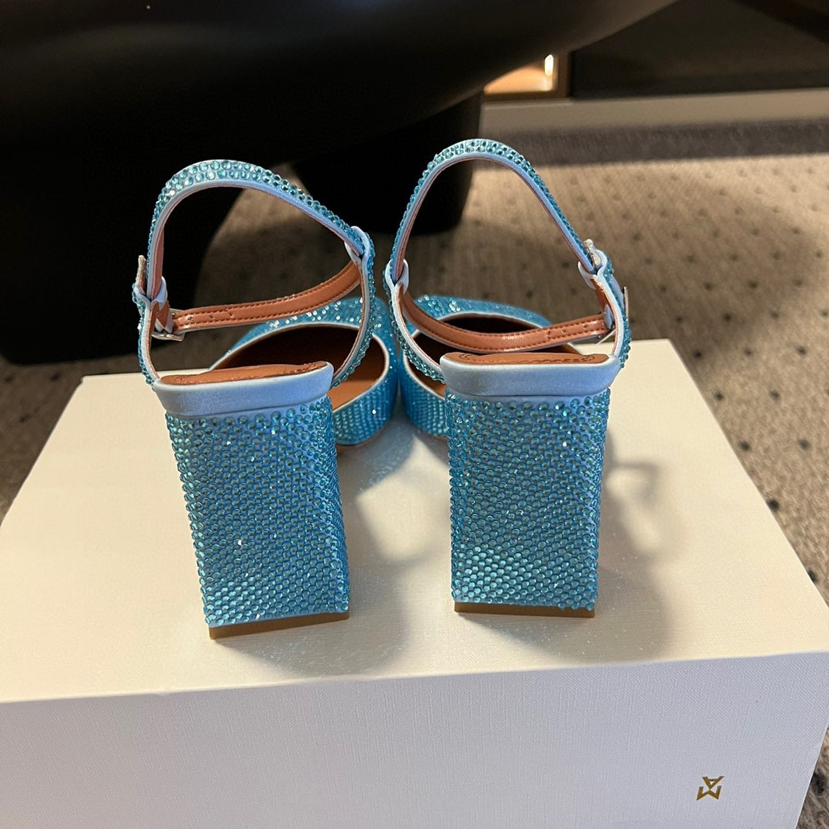 AMINA M HEELS