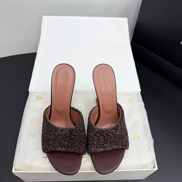 AMINA M HEELS
