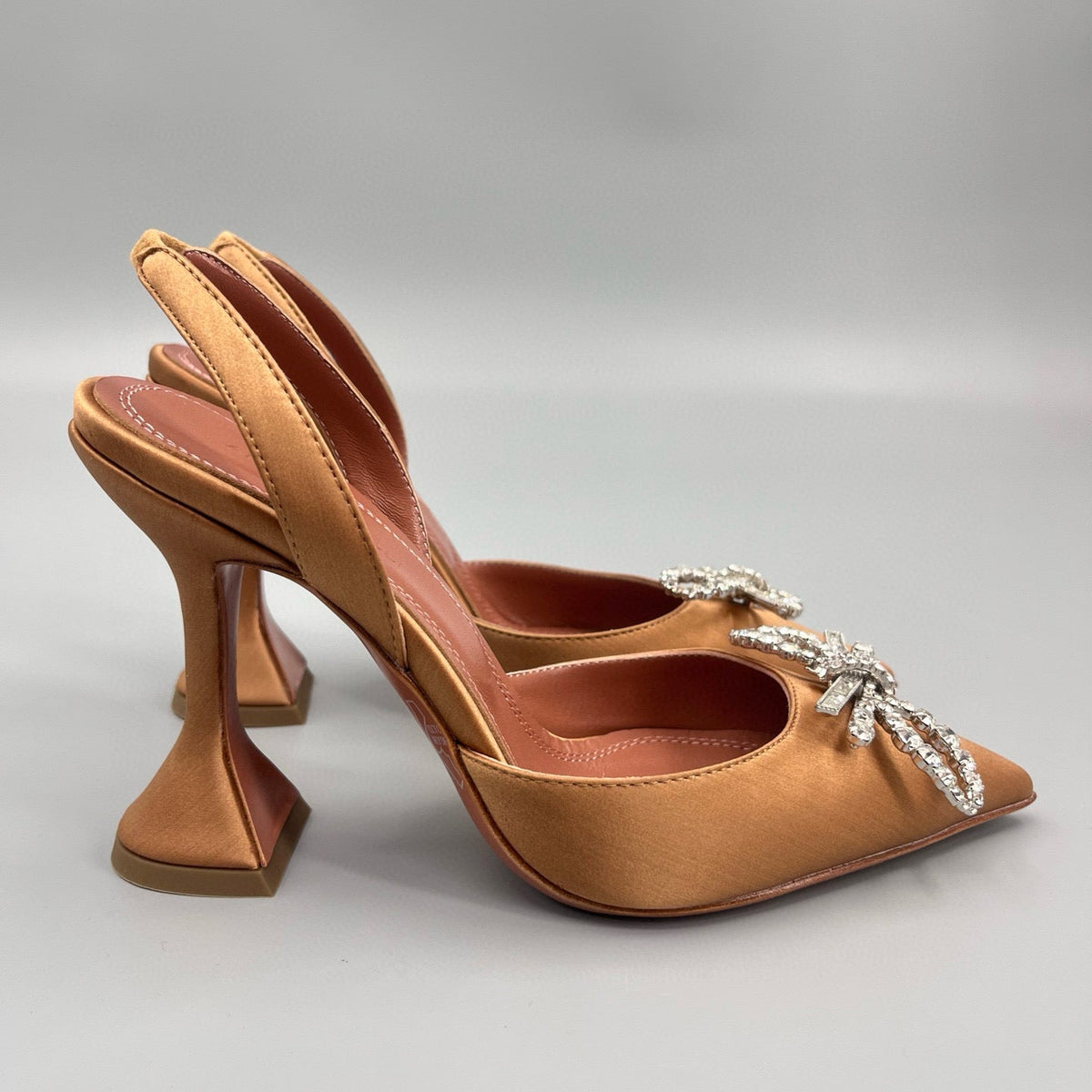 AMINA M HEELS