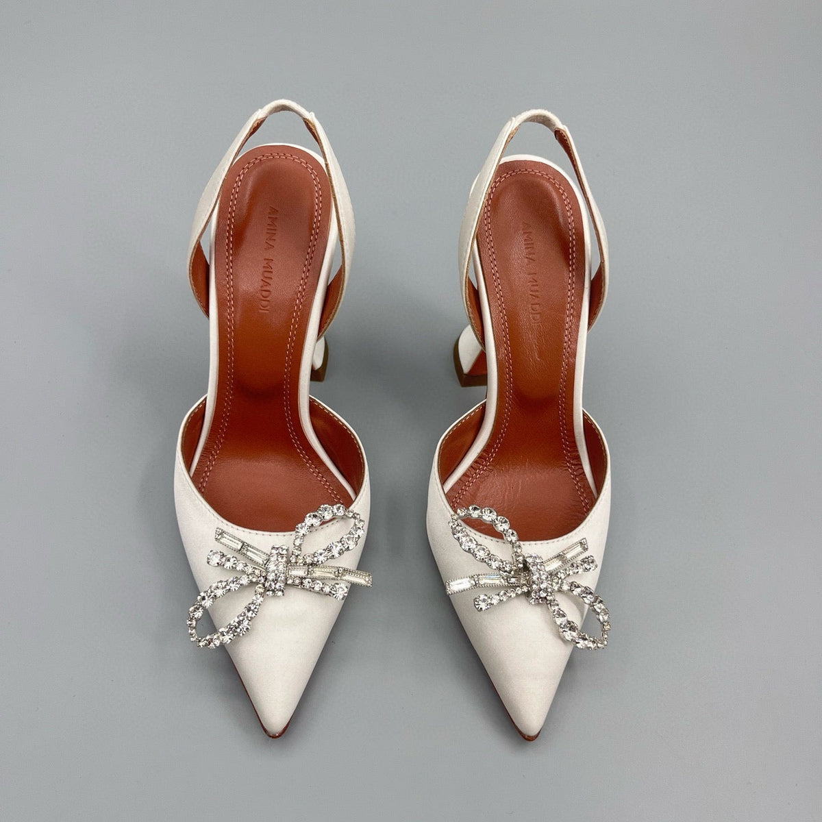 AMINA M HEELS