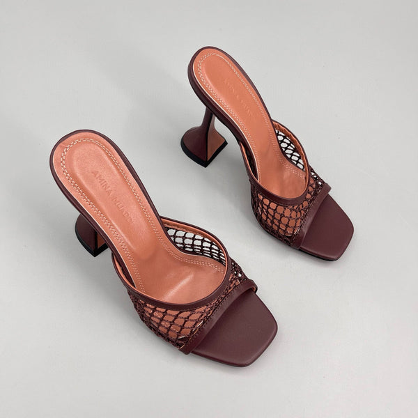 AMINA M HEELS