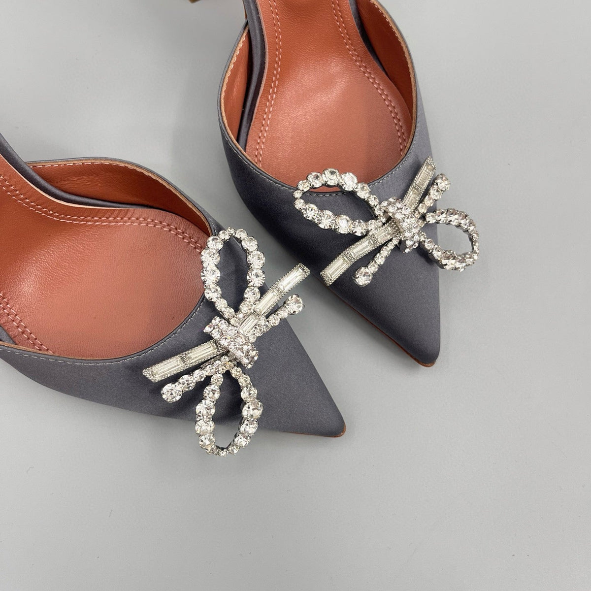 AMINA M HEELS
