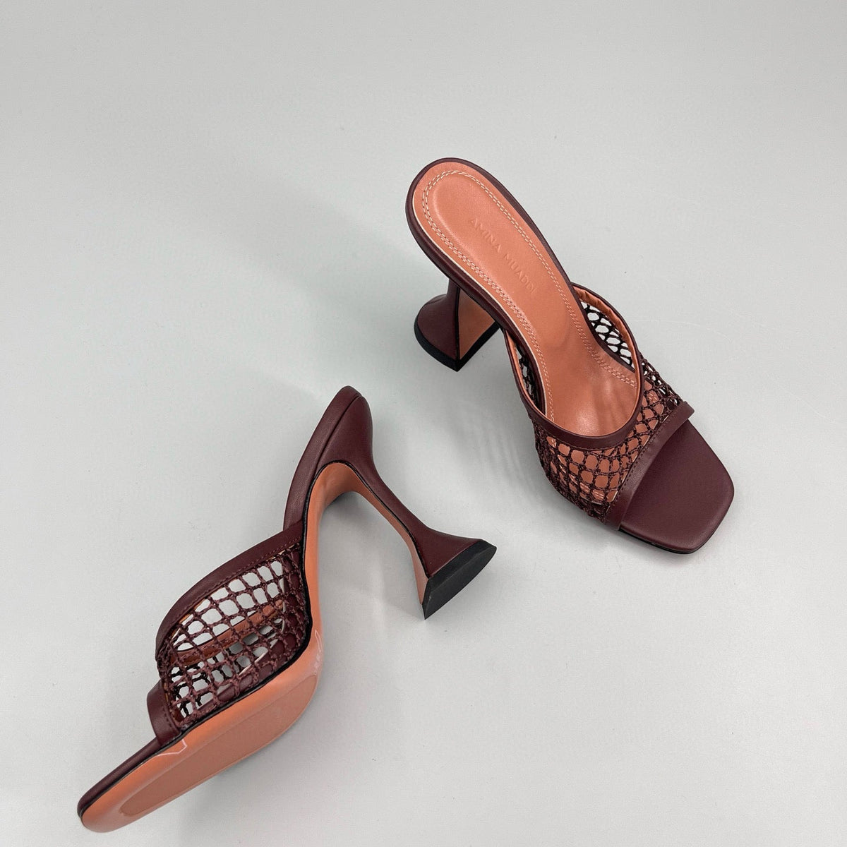 AMINA M HEELS
