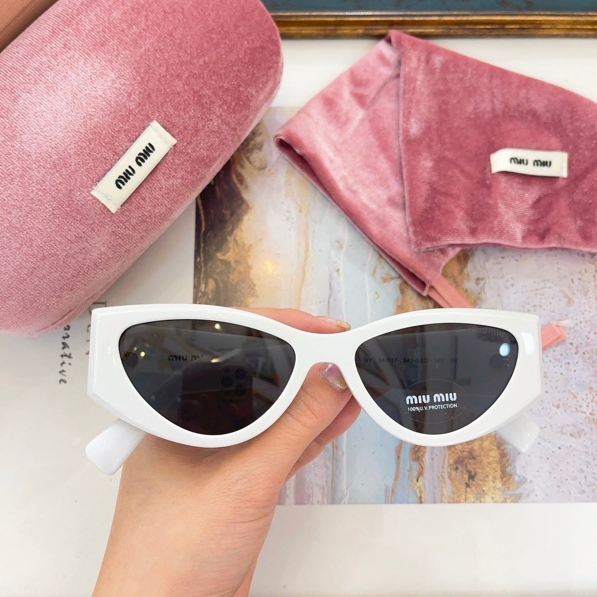 MIU M SUNGLASSES
