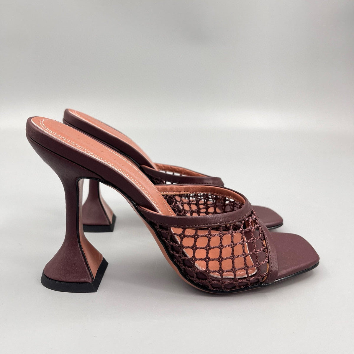 AMINA M HEELS
