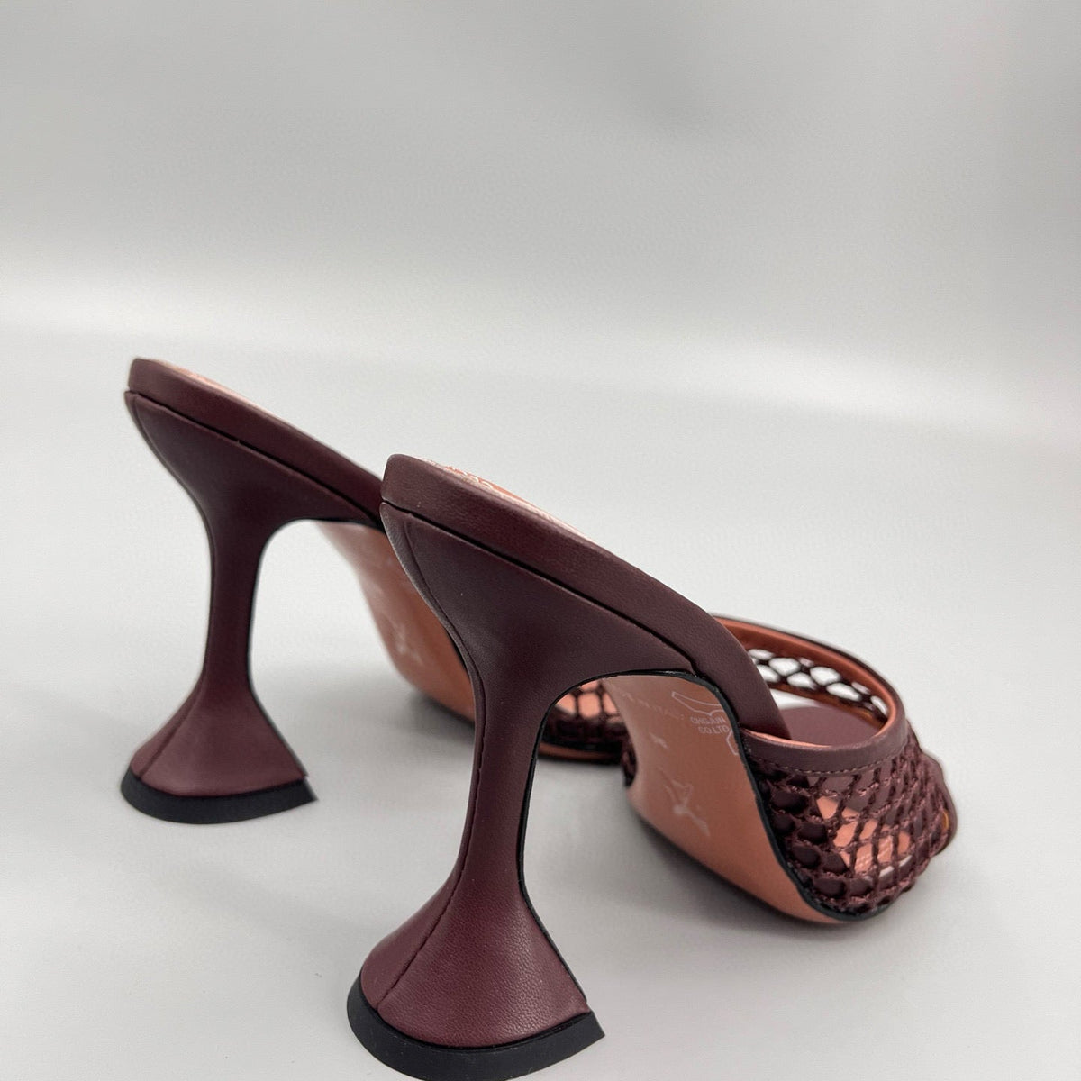 AMINA M HEELS