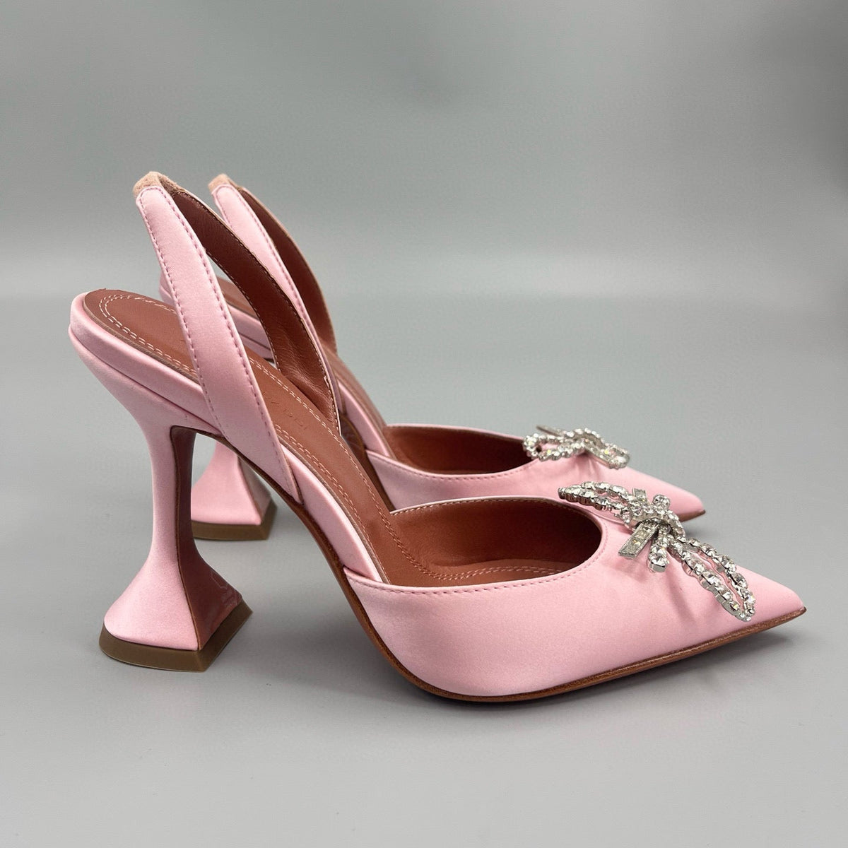AMINA M HEELS