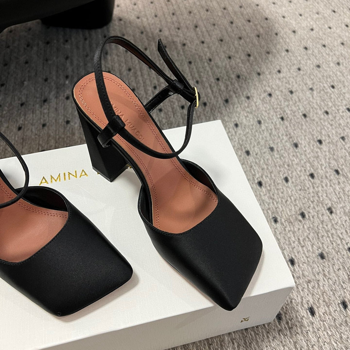 AMINA M HEELS