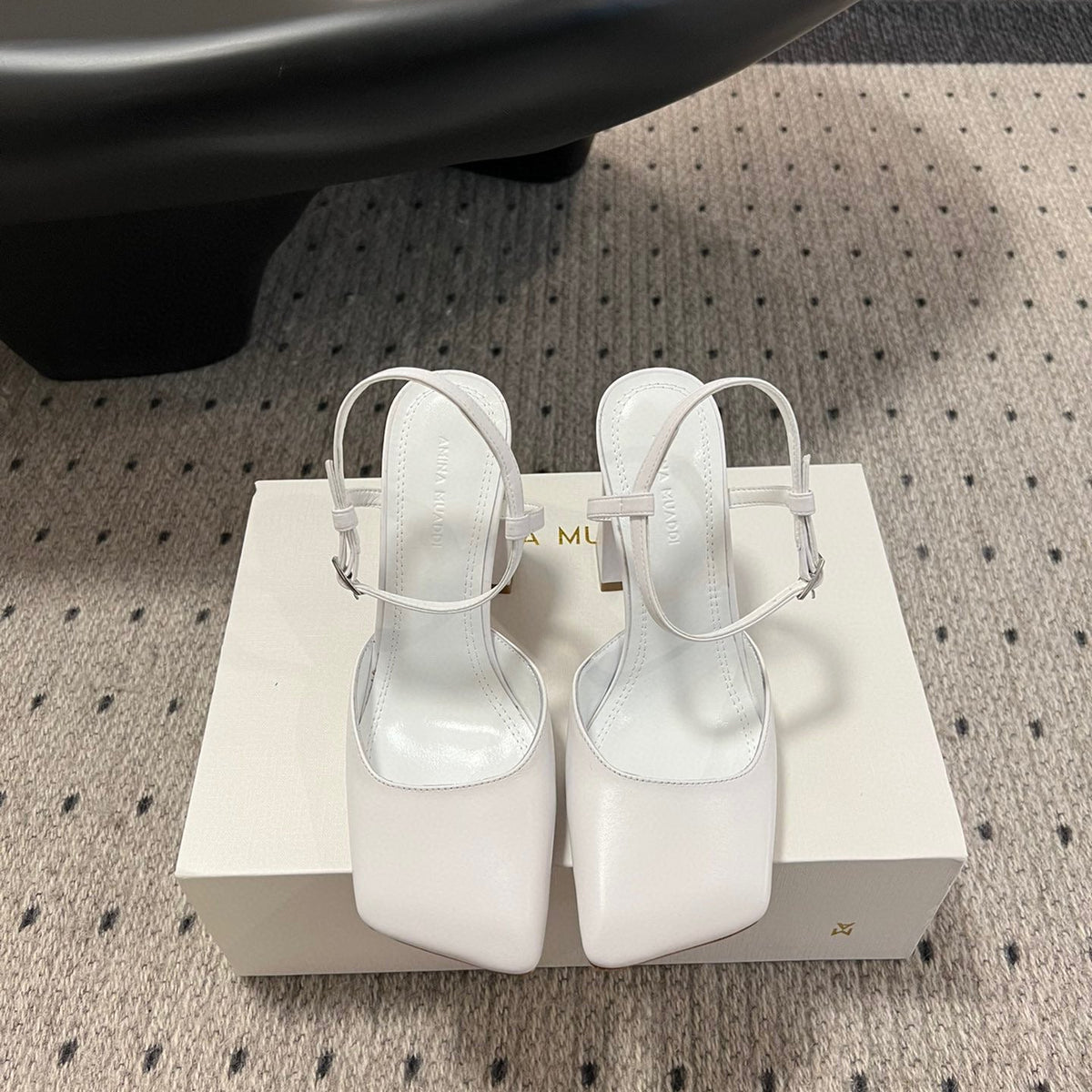 AMINA M HEELS