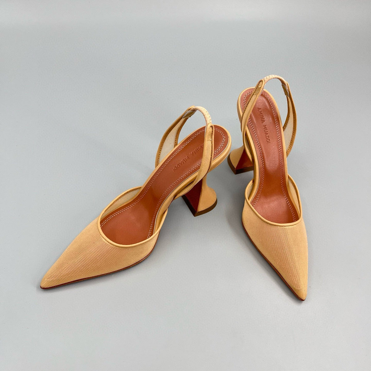 AMINA M HEELS