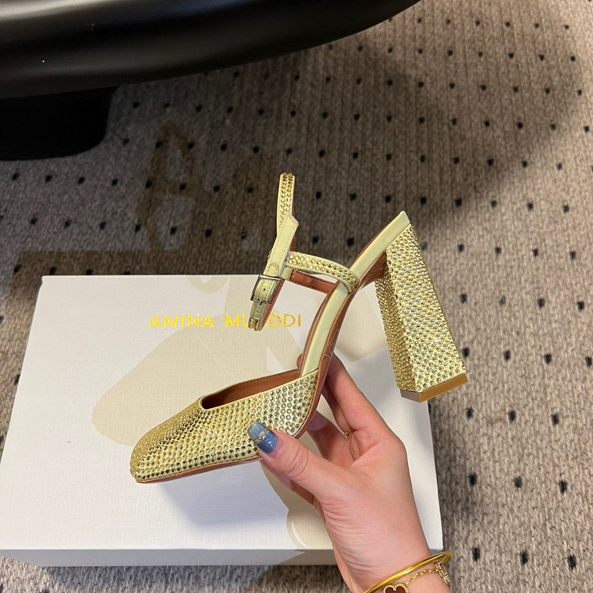 AMINA M HEELS