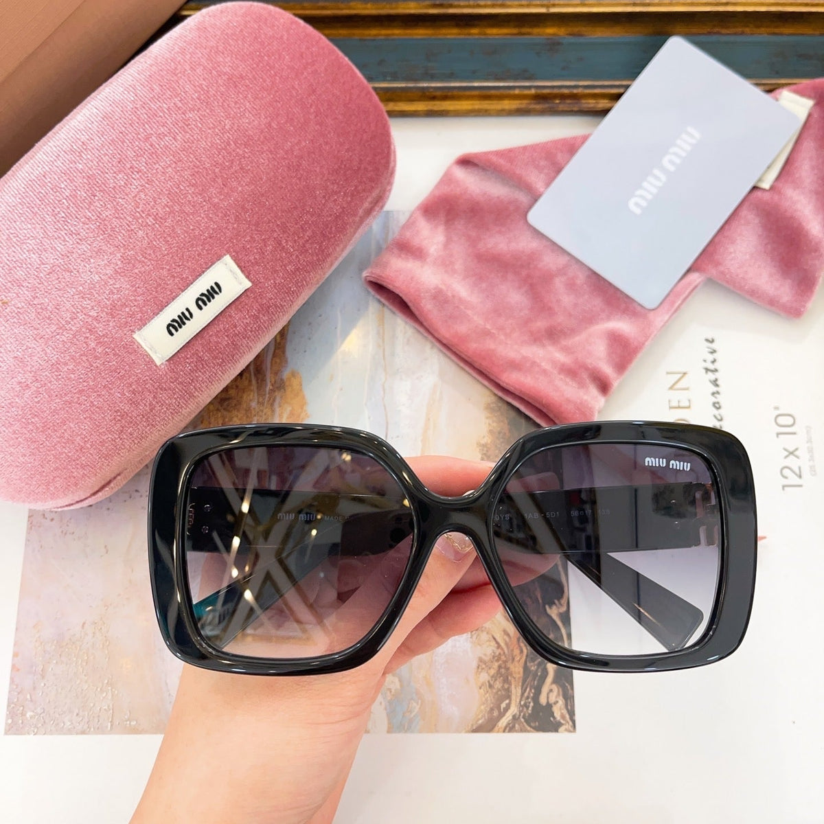 MIU M SUNGLASSES