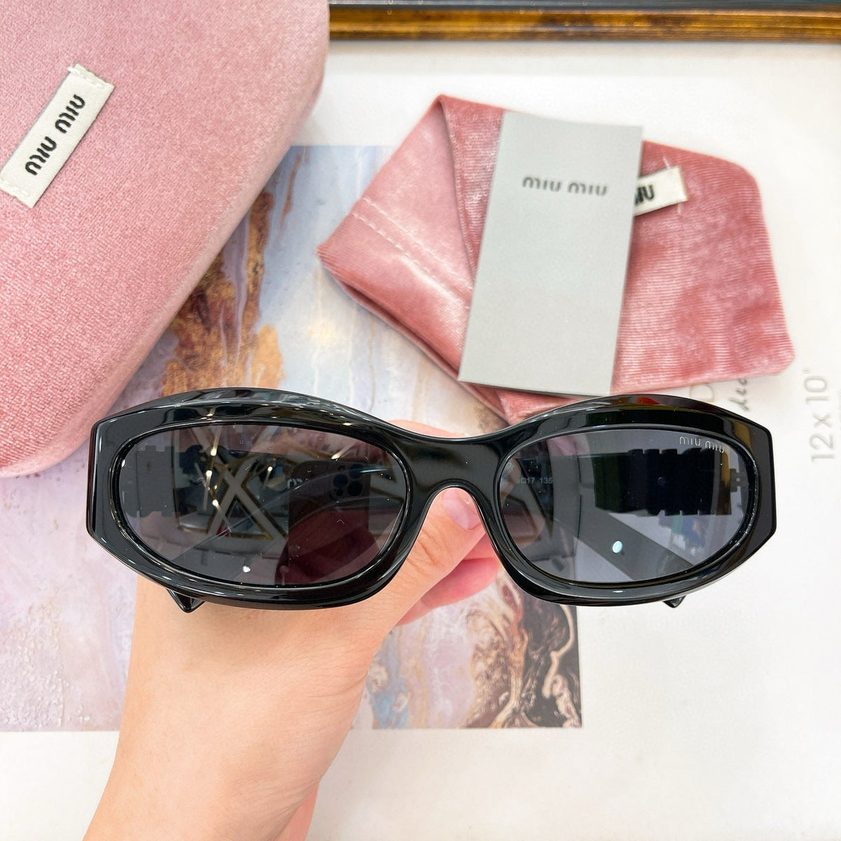 MIU M SUNGLASSES