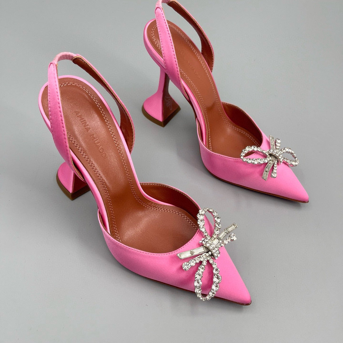 AMINA M HEELS