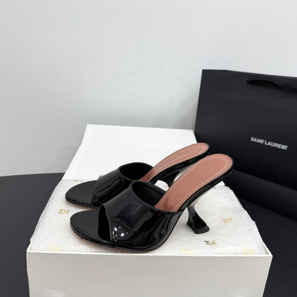 AMINA M HEELS