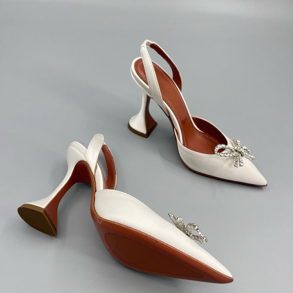 AMINA M HEELS