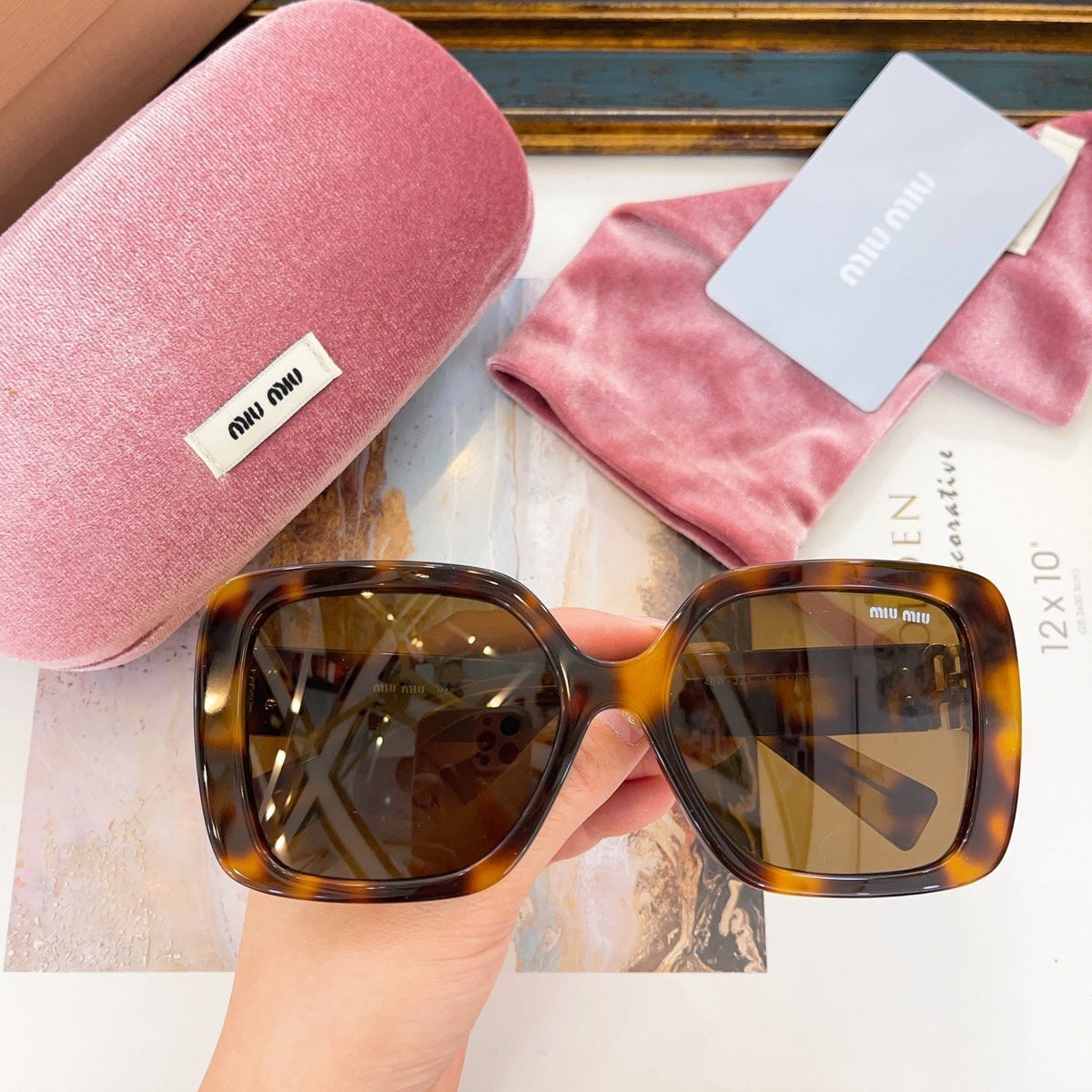 MIU M SUNGLASSES