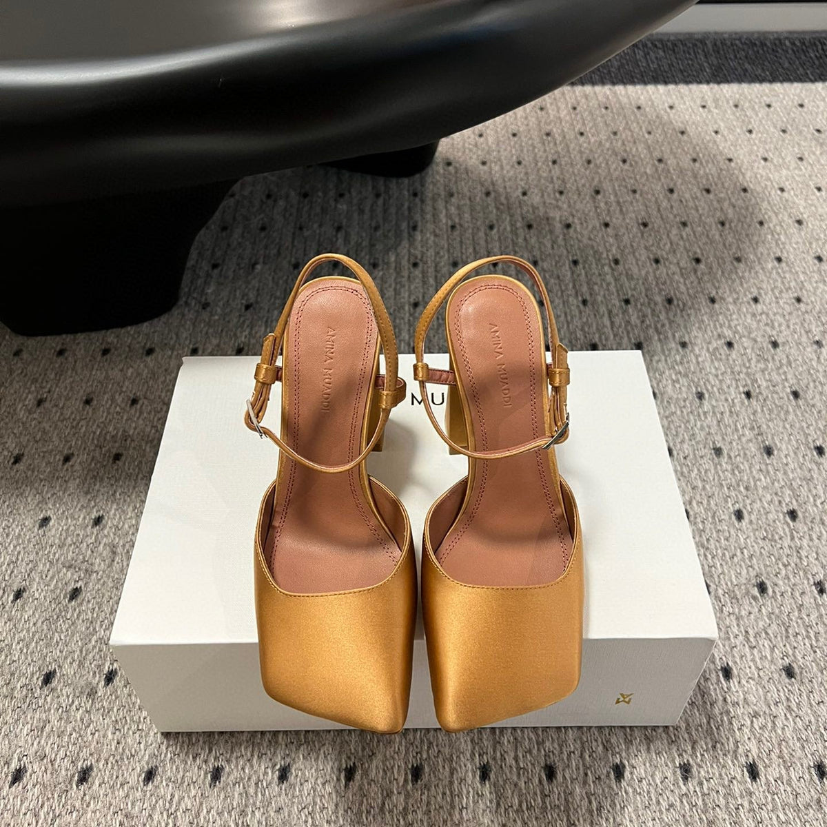 AMINA M HEELS