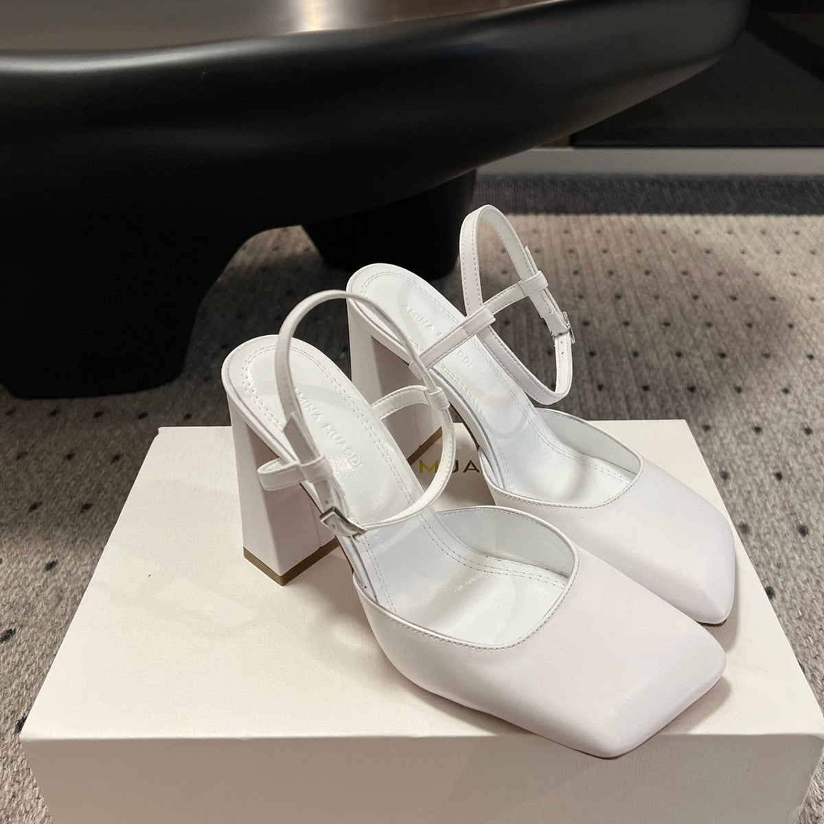 AMINA M HEELS