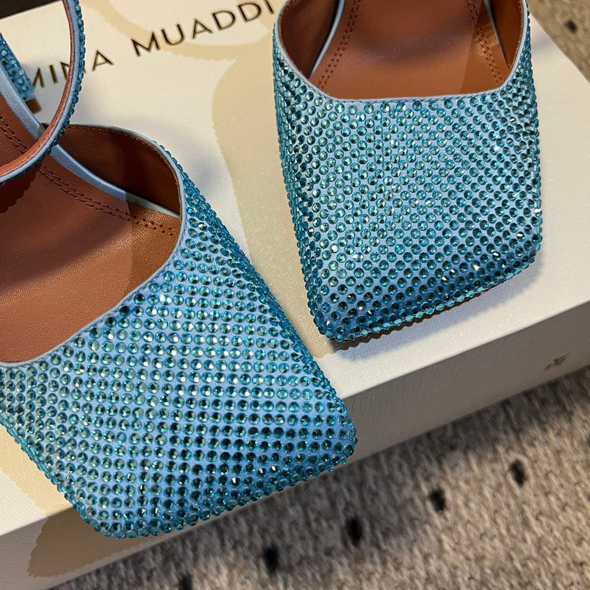 AMINA M HEELS