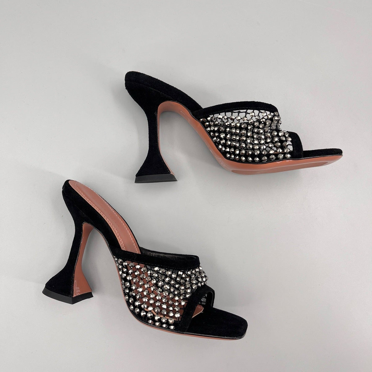 AMINA M HEELS