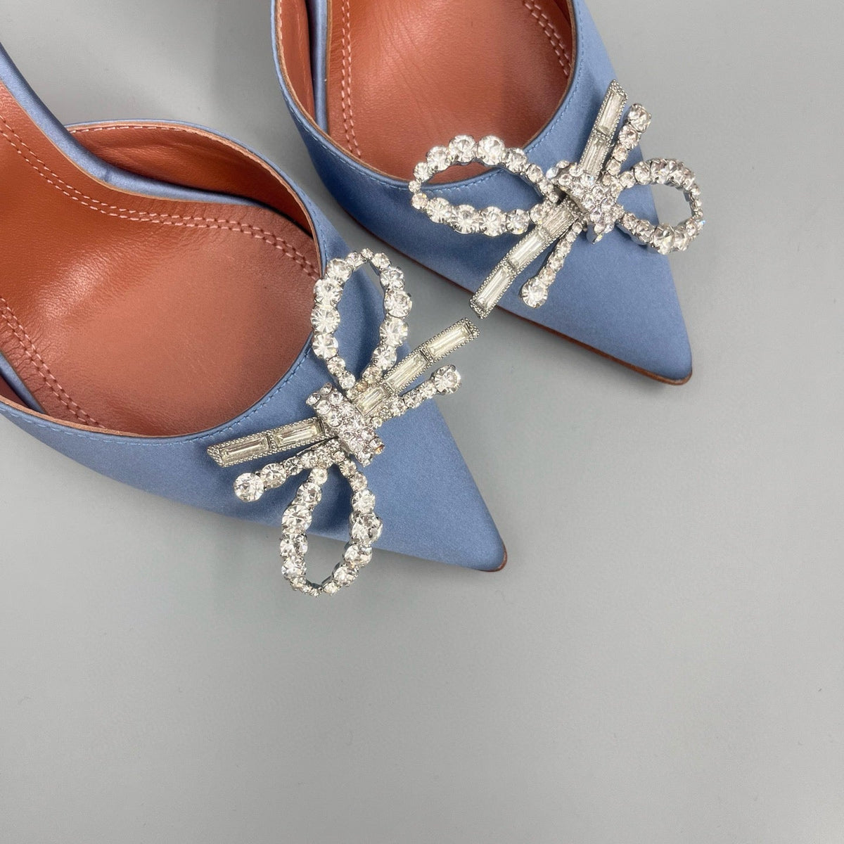 AMINA M HEELS