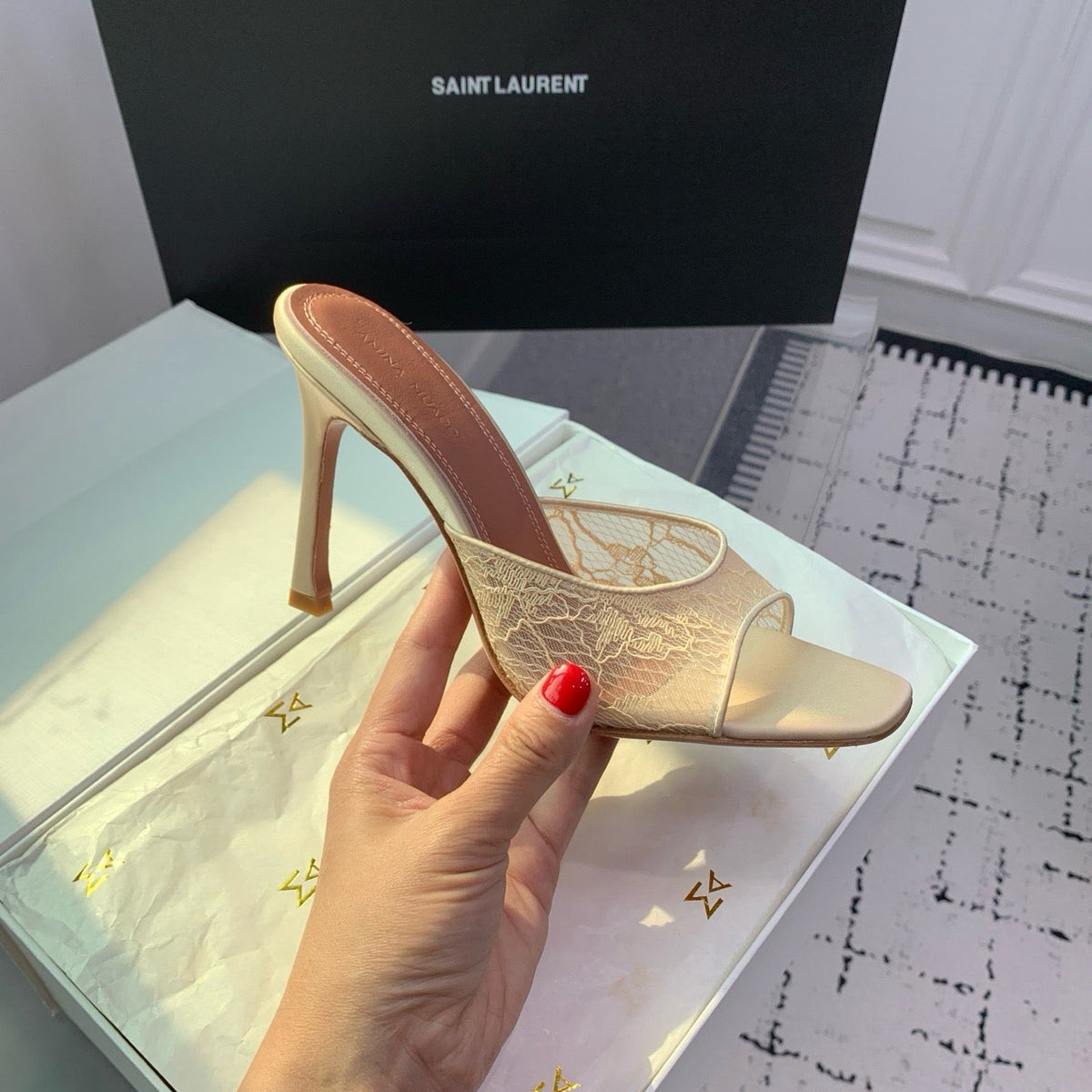 AMINA M HEELS