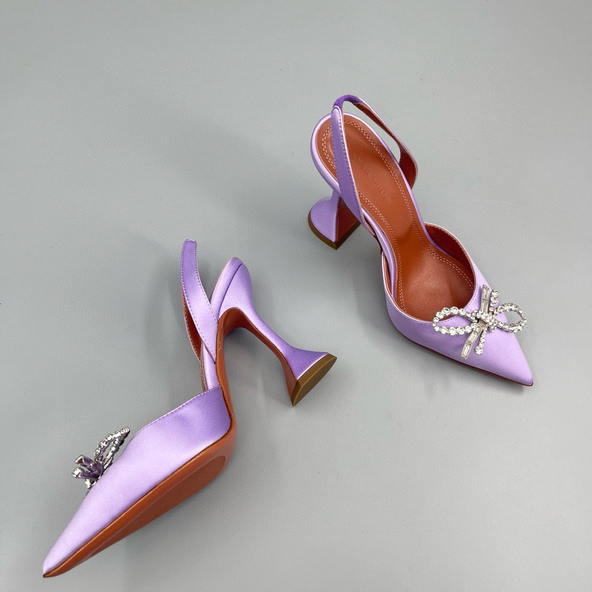 AMINA M HEELS