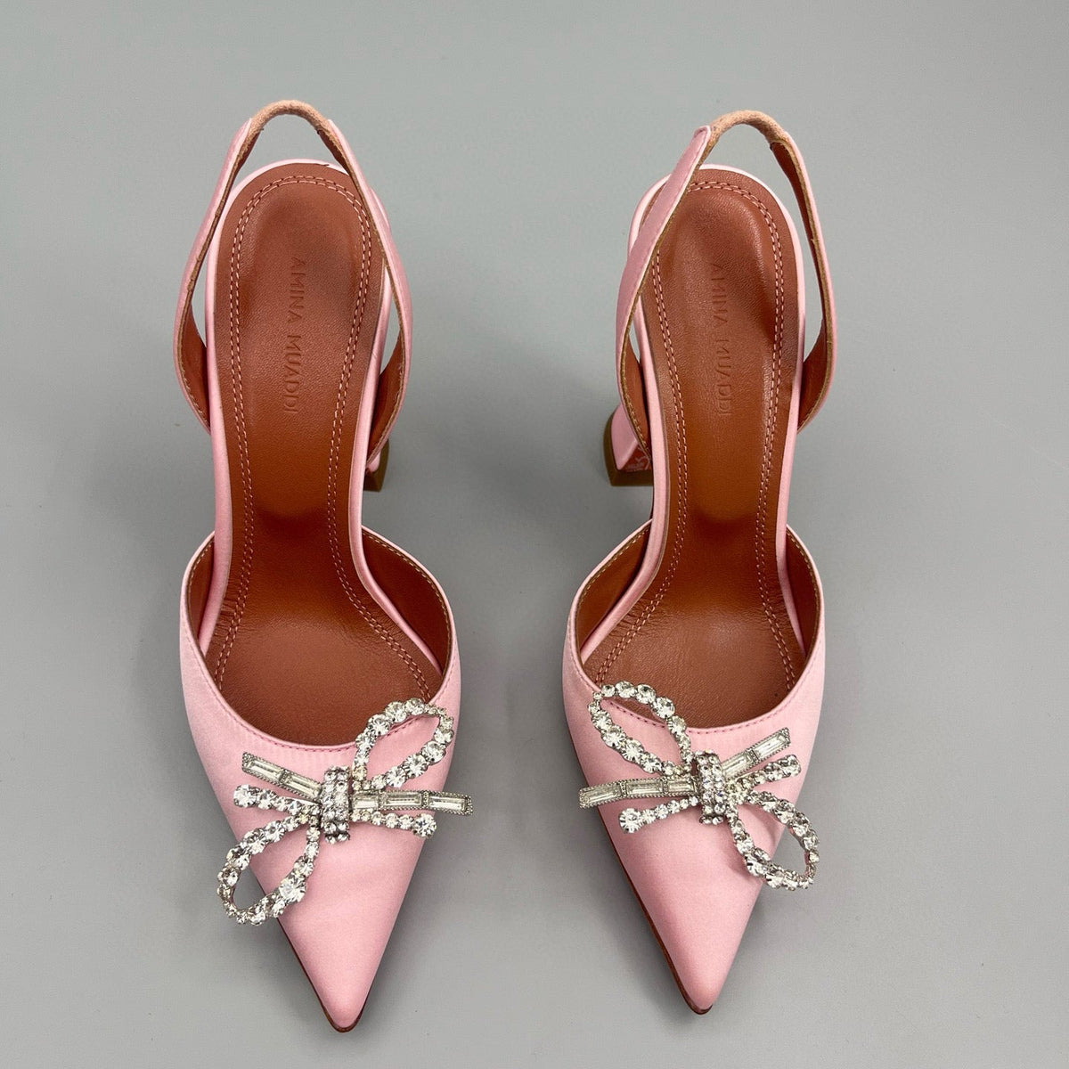 AMINA M HEELS