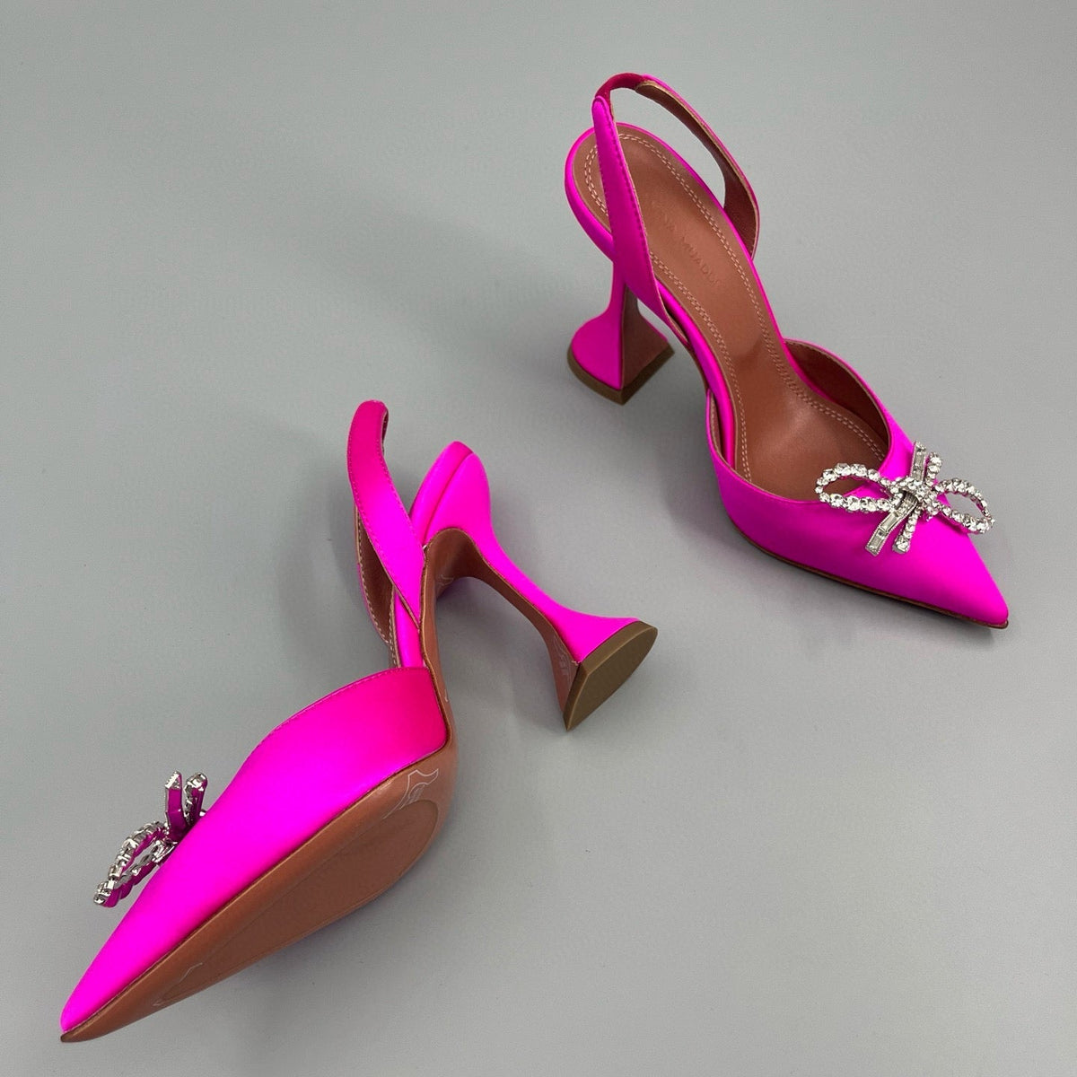 AMINA M HEELS