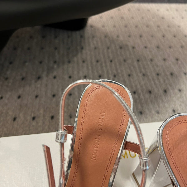 AMINA M HEELS