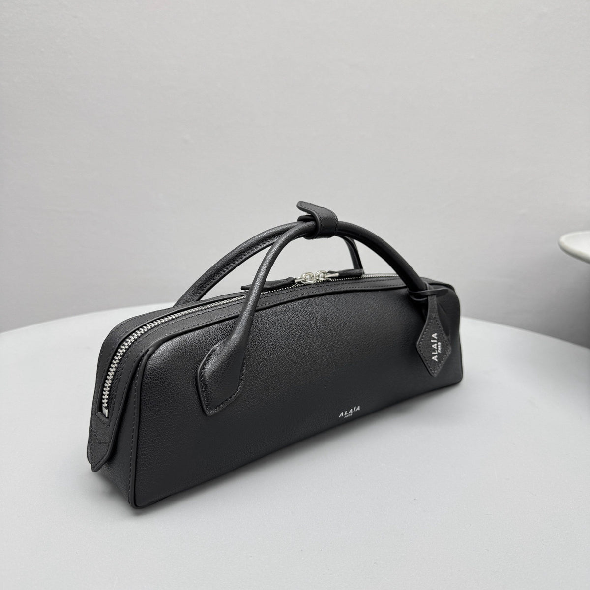 ALAIA LE TECKEL CLUTCH
