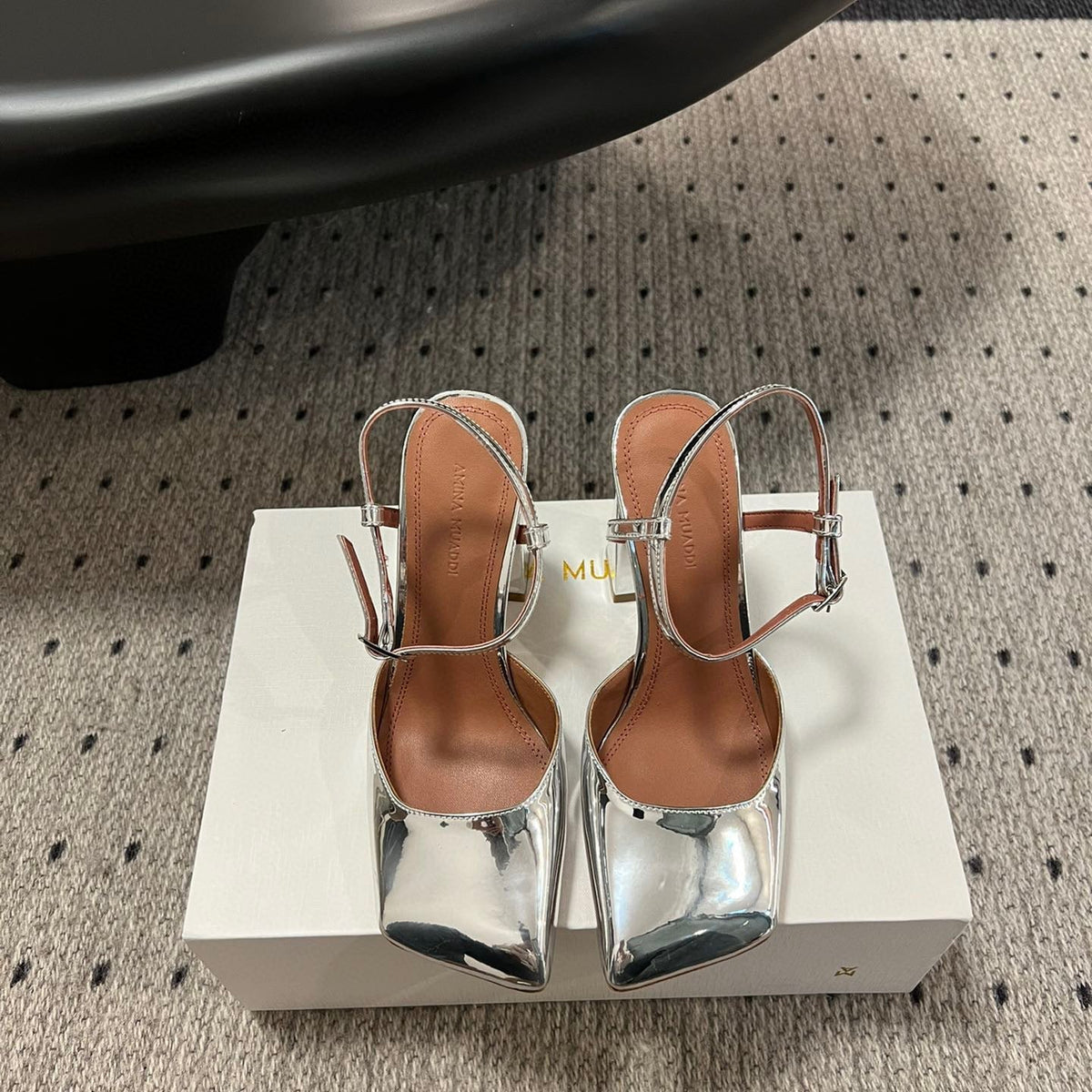 AMINA M HEELS
