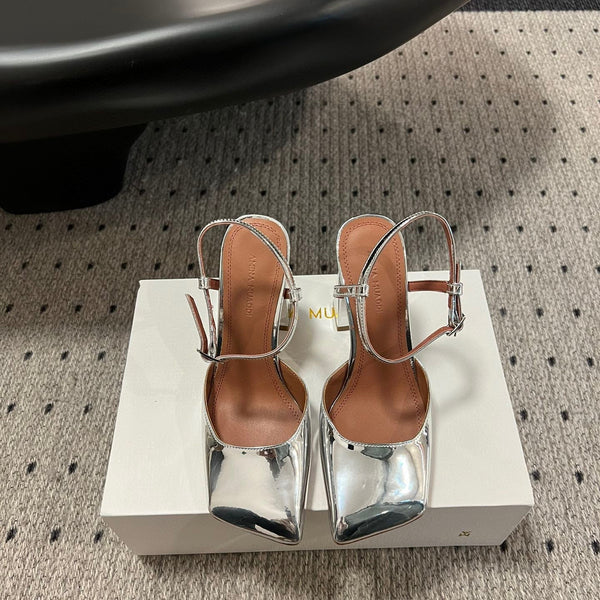 AMINA M HEELS