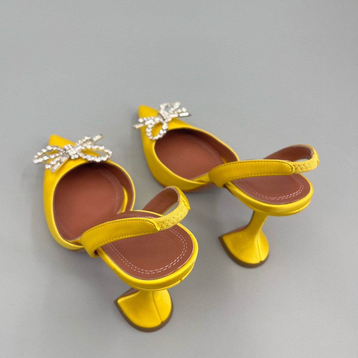 AMINA M HEELS