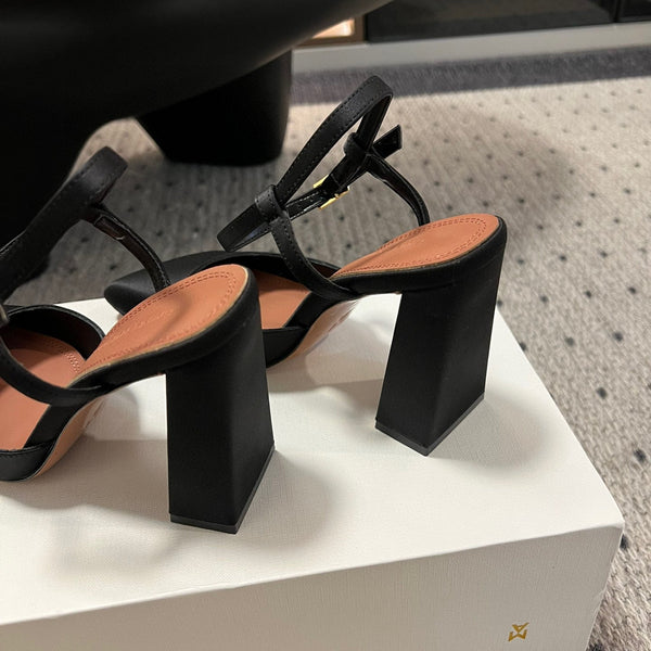 AMINA M HEELS