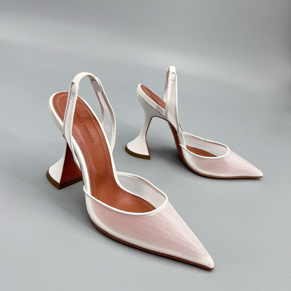 AMINA M HEELS