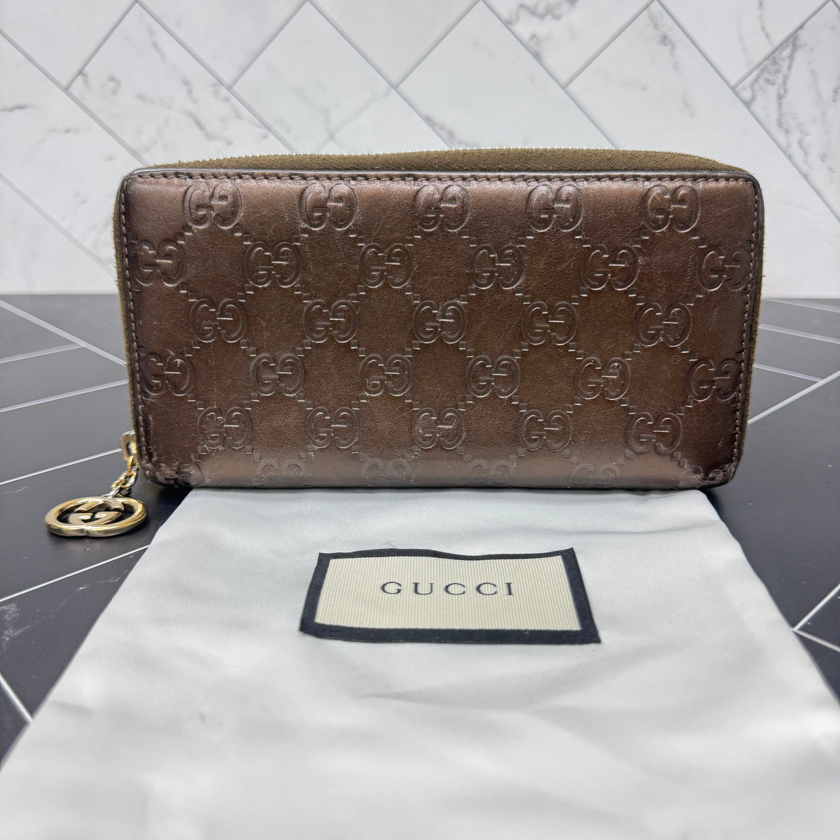 Gucci Bronze Guccisima Zippy Wallet