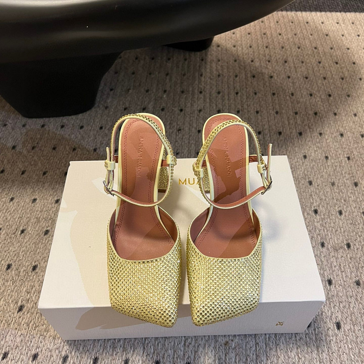 AMINA M HEELS