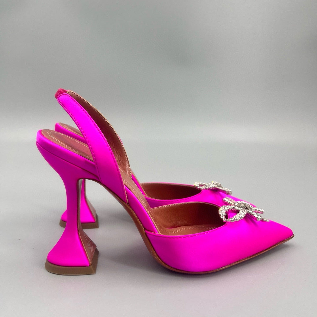 AMINA M HEELS