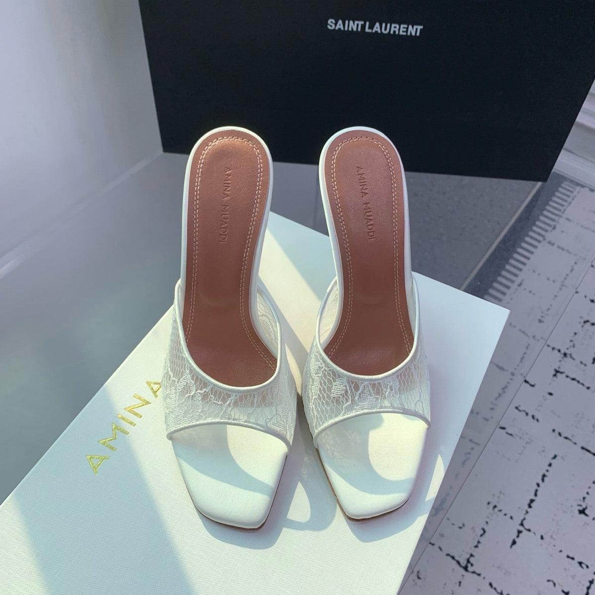 AMINA M HEELS