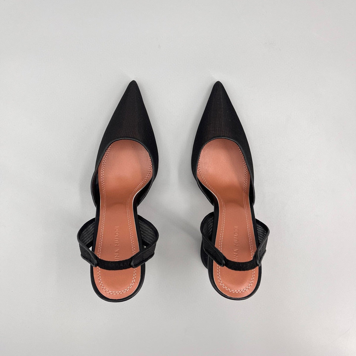 AMINA M HEELS