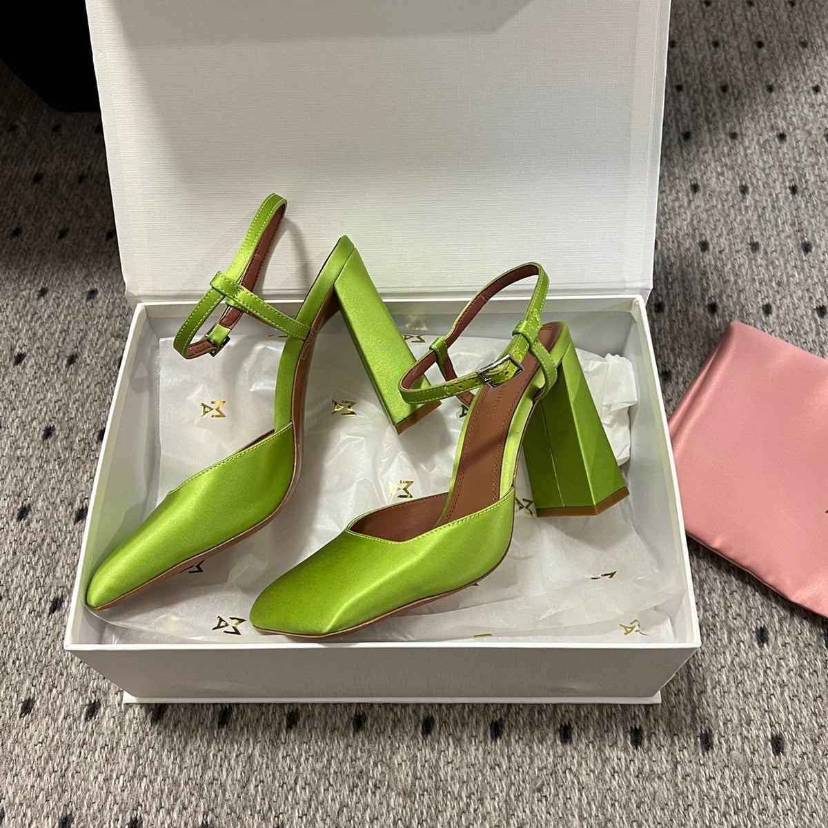 AMINA M HEELS