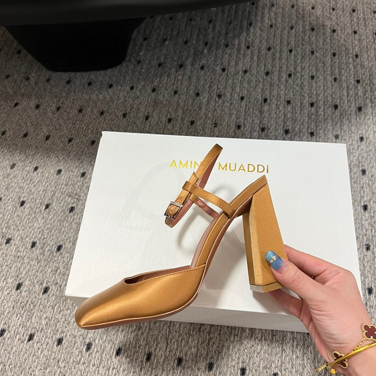 AMINA M HEELS