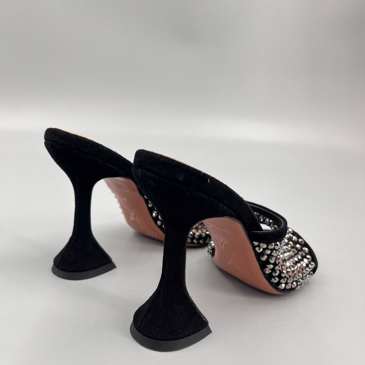 AMINA M HEELS