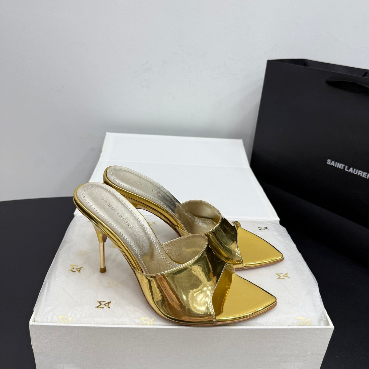AMINA M HEELS