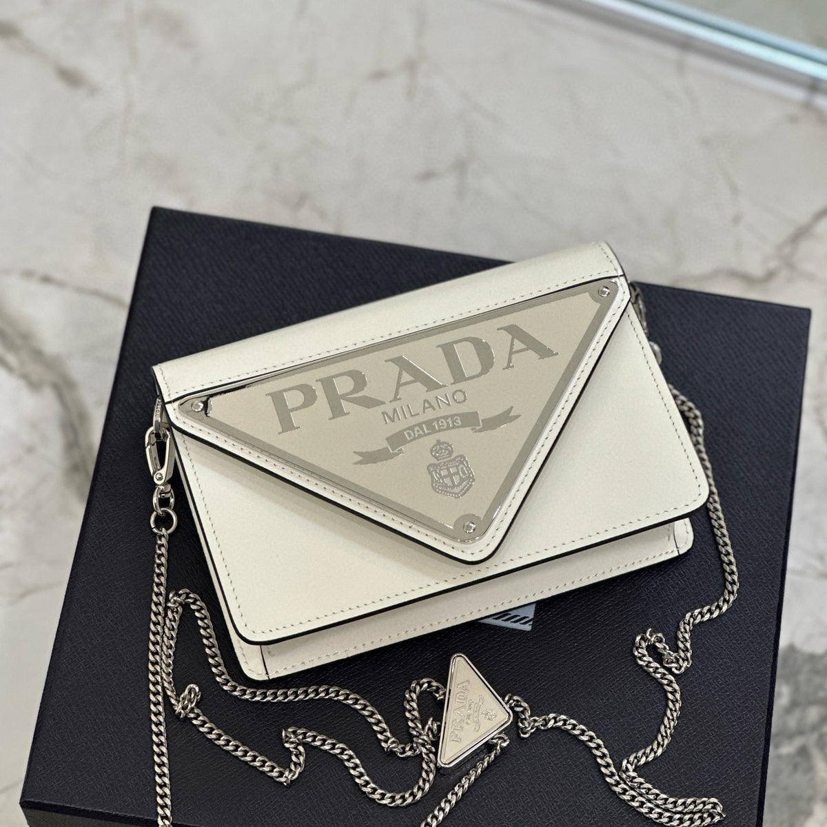 PD TRIANGLE LOGO BUFFED SHOULDER BAG